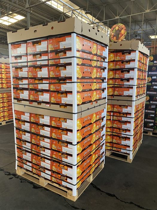 Two full pallets of Good Seed Egyptian orange cartons waiting to load